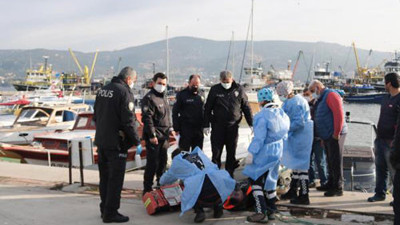 Foça'da balıkçı barınağında gizemli ceset bulundu