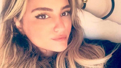 Evinde ölü bulunan genç kadın toprağa verildi