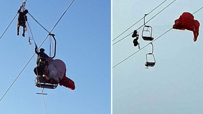 Paraşütçüler teleferik telesiyej hattında asılı kaldı