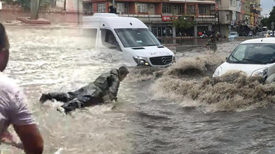 Sıcaktan bunalan vatandaş göle dönen yolda yüzmeye çalıştı