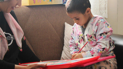 Minik Asiye evine döndü. Pitbull saldırısına uğramıştı