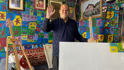 İYİ Partili Lütfü Türkkan'dan engelli ressam Muhammed Yalçın'a yardım