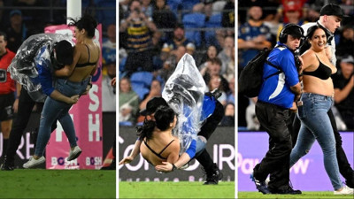 Sahaya yarı çıplak giren kadına güvenliğin müdahalesi tepki topladı