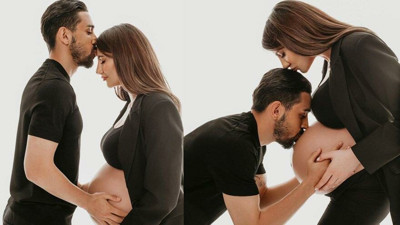 Ünlü futbolcu eşi ile hamilelik pozu verdi!