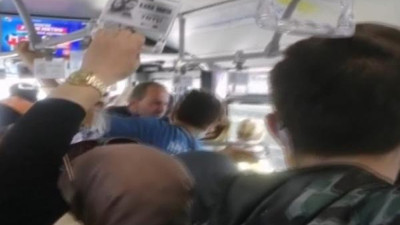 Metrobüste şok eden kavga: Senin gibi eşim olsa kafasını koparırım