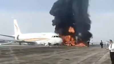 Yolcu uçağı alev topuna döndü
