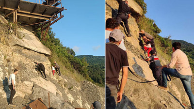 Kayalıklarda mahsur kalan dayı-yeğen halatla kurtarıldı