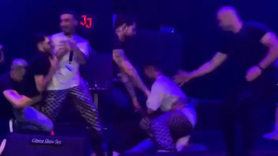 Konserde büyük panik! Hayranının saldırısına uğrayan Uzi konseri yarıda kesti