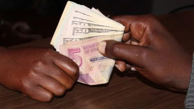 Parası aşırı değer kaybeden Zimbabve piyasaya 'altın para' sürmeye hazırlanıyor