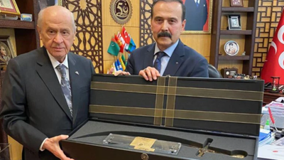 Bahçeli’ye kılıç hediye eden suç örgütü liderinden BİM’in yöneticisine tehdit