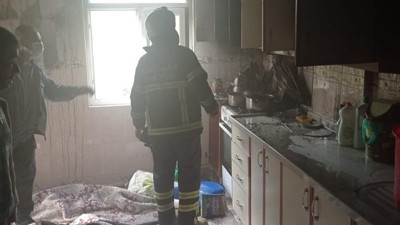 Evde çıkan yangında 1 kişi zehirlendi