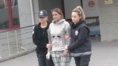 Evini yakan kadın tutuklandı