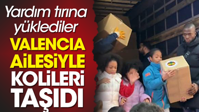 Valencia ailesiyle birlikte yardım kolilerini tırlara yükledi: Duygulandıran tablo