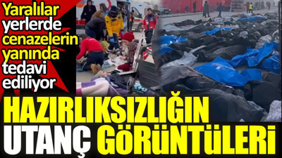 Hazırlıksızlığın utanç görüntüleri. Yaralılar, toplu cenazelerin yanında yerlerde tedavi ediliyor