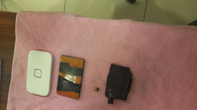 Ehliyet sınavında 'kopya' düzeneğiyle yakalandı