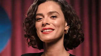 Özge Özpirinçci bebek pusetini pazar arabası yaptı