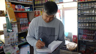 Hayırseverler bakkalın veresiye defterini sildi