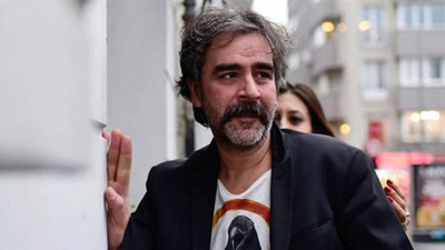 Gazeteci Deniz Yücel hakkında yakalama kararı verildi