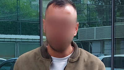 Tartıştığı eşinin kafasında şişe kıran koca tutuklandı