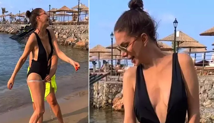 Tuğba Özerk plajda ölçü aldırdı. Genç kızlara taş çıkarttı