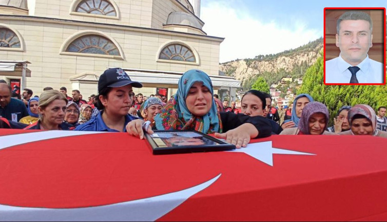 Şehit polisin eşinden yürek yakan veda: Tabuta sarılıp fotoğrafını öptü
