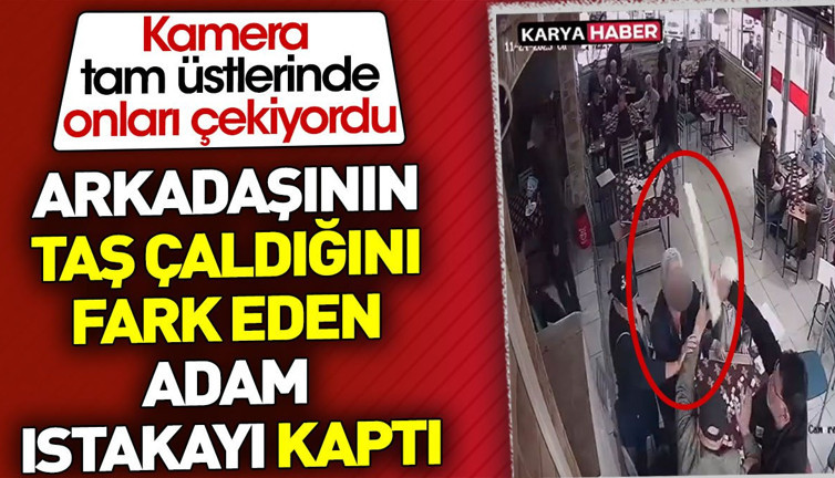 Arkadaşının taş çaldığını fark eden adam ıstakayı kaptı. Kamera tam üstlerinde onları çekiyordu