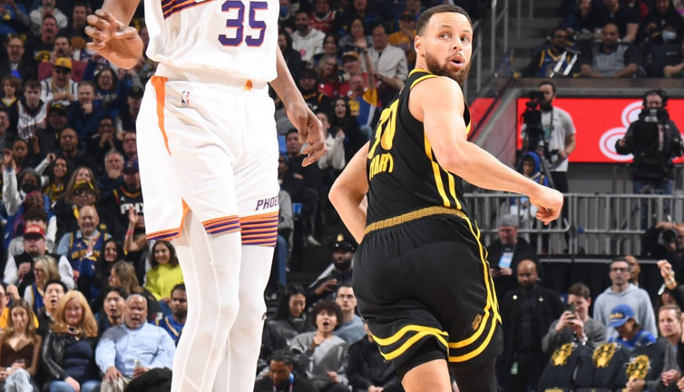 Curry'nin son saniye basketi Warriors'a galibiyeti getirdi