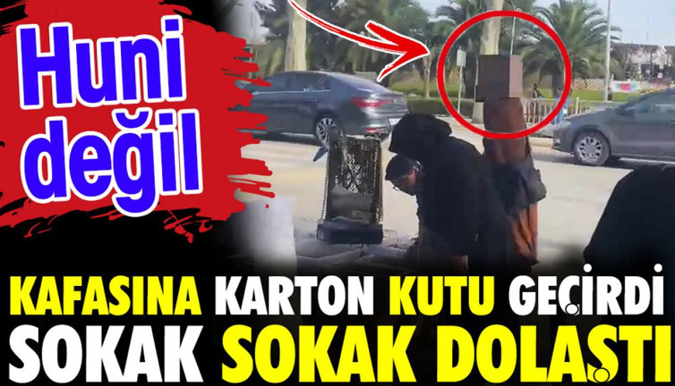 Kafasına karton kutu geçirip sokak sokak dolaştı. Huni değil