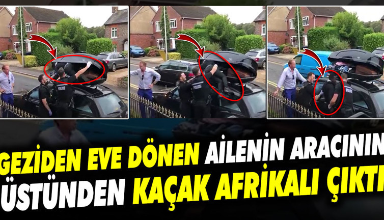 Geziden eve dönen ailenin aracının üstünden kaçak Afrikalı çıktı