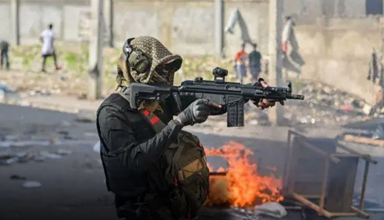 Haiti'de katliam! Din adamının başını keserek katlettiler