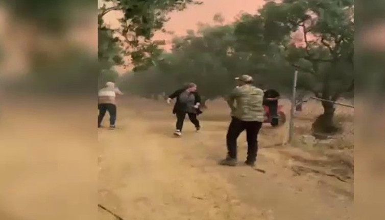 Yangının ortasında can pazarı! Zamanla yarıştılar