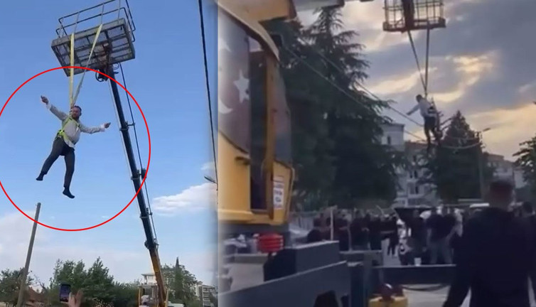 Bursa’da sıra dışı gelenek! Damadı metrelerce yukarı çıkartıp vinçte sallandırdılar!