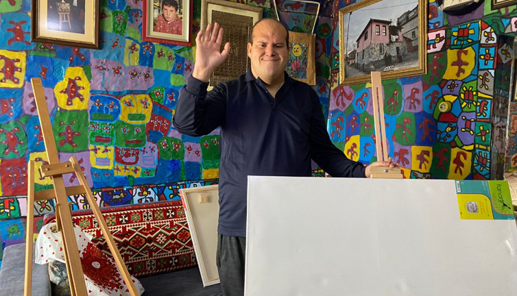 İYİ Partili Lütfü Türkkan'dan engelli ressam Muhammed Yalçın'a yardım