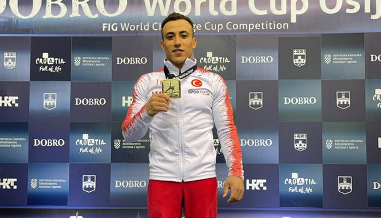 Adem'den cimnastikte altın madalya