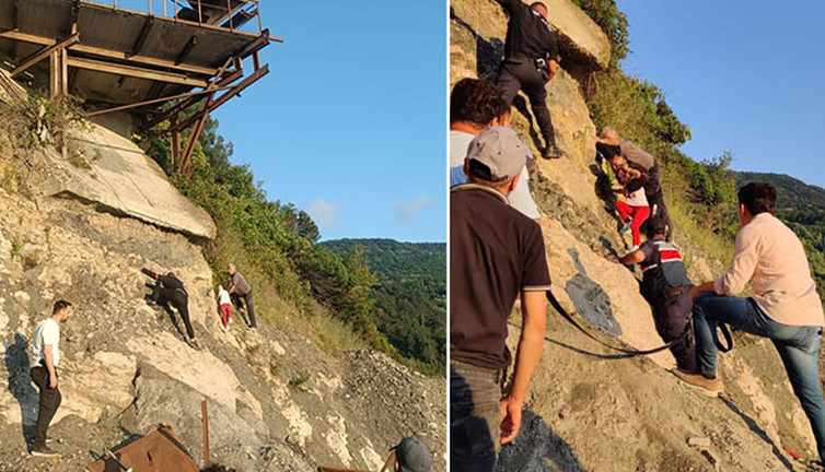 Kayalıklarda mahsur kalan dayı-yeğen halatla kurtarıldı