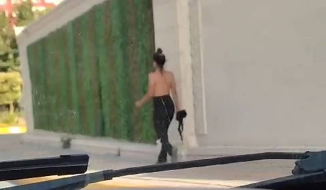 Sokakta üstsüz yürüyen kadın görenleri şaşkına çevirdi. ‘Beni siz delirttiniz’ diye bağırdı - Resim: 2