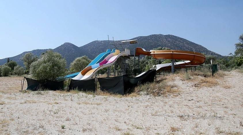 Yok oluşun fotoğrafı. Su kaydırağı ortada kaldı - Resim: 5